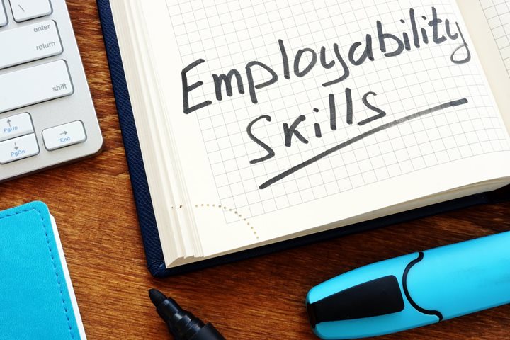 highlighter and notebook with text employability skills
